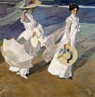 Joaquin Sorolla y Bastida Strolling along the Seashore